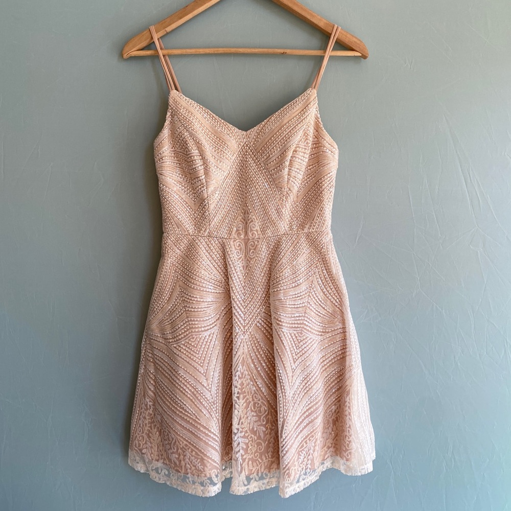 Brocade and geometric pattern mini dress